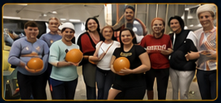 Fitness training class with medicine balls
