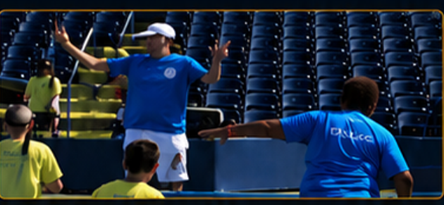 Dave Colby coaching on outdoor courts